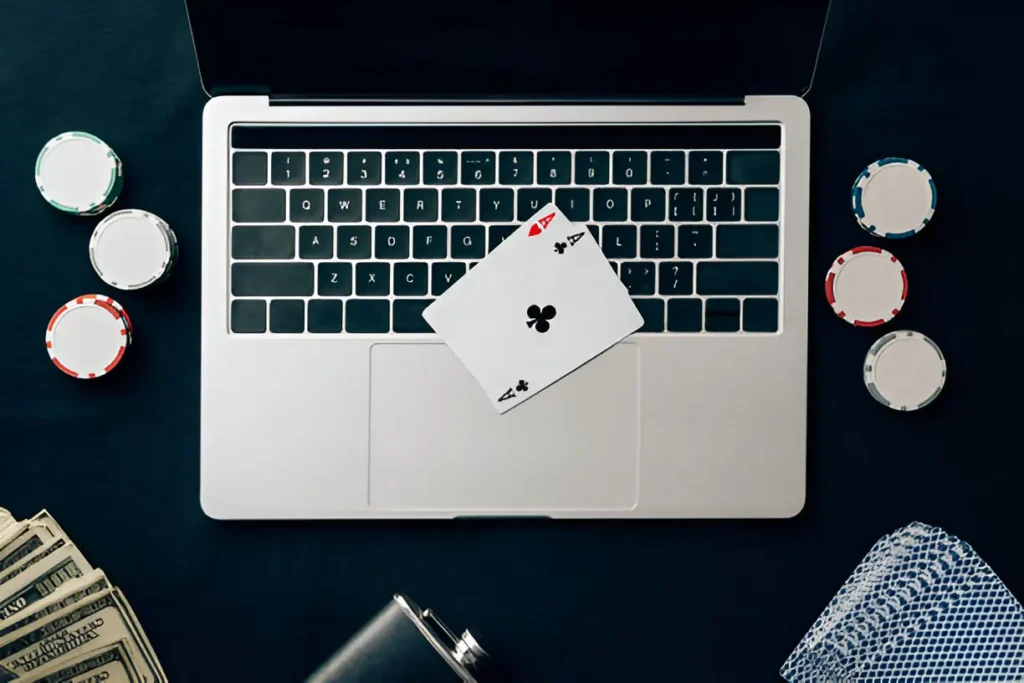 https://www.istockphoto.com/photo/online-gambling-concept-with-chips-and-money-on-laptop-gm946888608-258561303